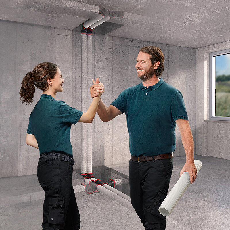 men and women are shaking hands 